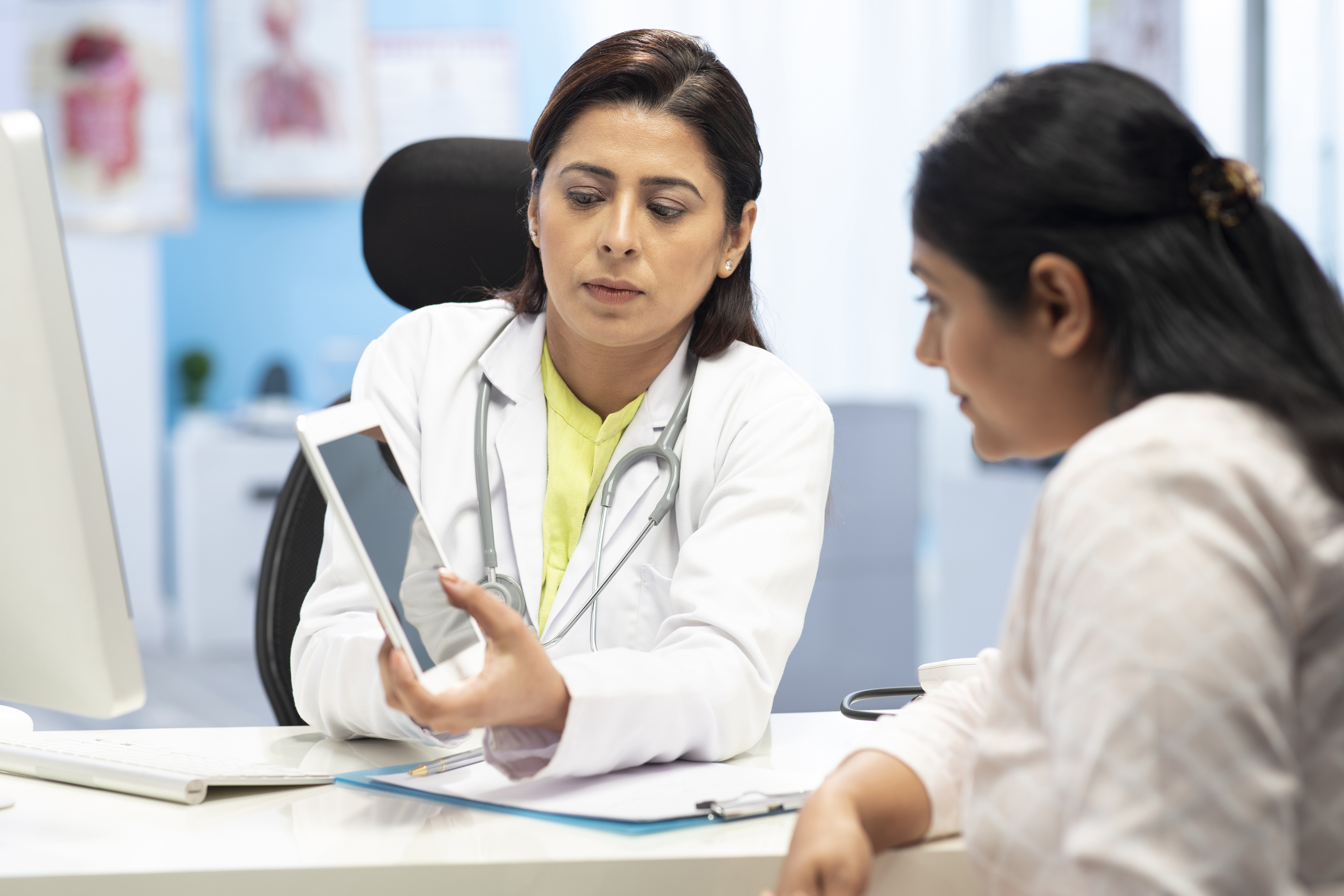 Doctor and patient looking at results